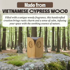 Wooden owl figurine in a forest setting with text: made from Vietnamese Cypress wood, handcrafted for rustic charm