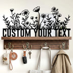 Walnut wall-mounted key holder with a laser-cut wildflower design and custom text, keys and cap hanging