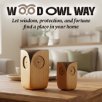 Two wooden owl figurines displayed on a table in a living room, text reads Wood Owl Way, wisdom protection and fortune