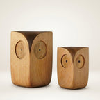 Two Wooden Minimalist Owl Figurines, big and small size, side by side on a plain background