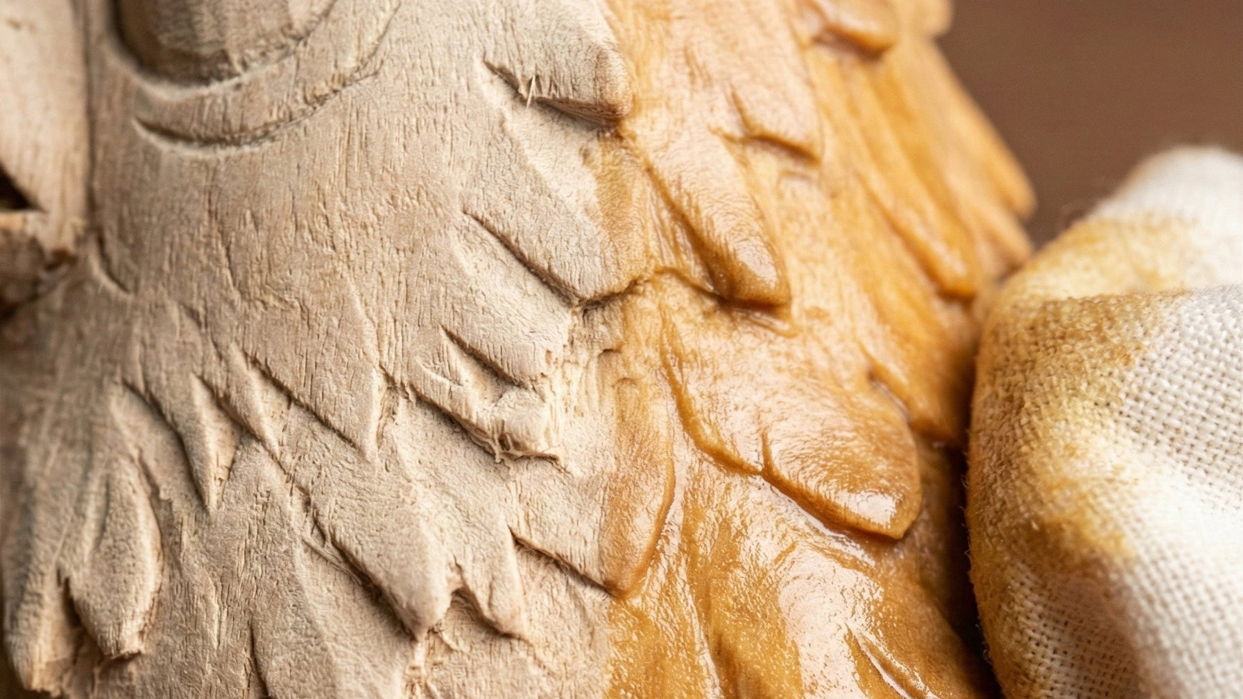 Wooden chicken sculpture with detailed carvings on a blurred background