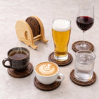Elephant coaster set with coffee, wine, beer, water, and tea on each coaster