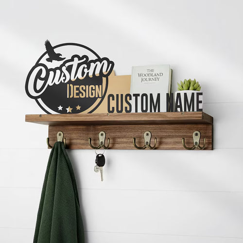 Walnut wall-mounted key holder with custom laser-cut logo design text, jacket and keys hanging