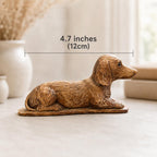 Wooden dachshund figurine with length measurement showing 4.7 inches